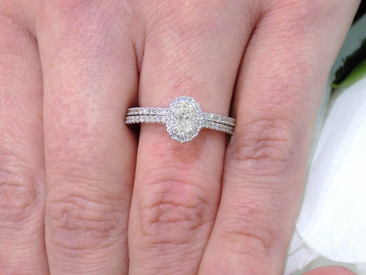 .73ct TW 2-Piece Halo Style Natural Oval Shape Diamond Wedding Set with .31ct Center Oval Diamond in Solid 14K White Gold - Straight Line/Halo Style with Matching Band