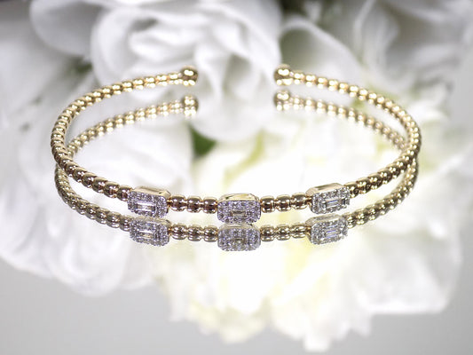 Women's .25ct TW Natural Diamond Twist Flex Bangle in 10K Yellow Gold - Diamond Cuff Bracelet