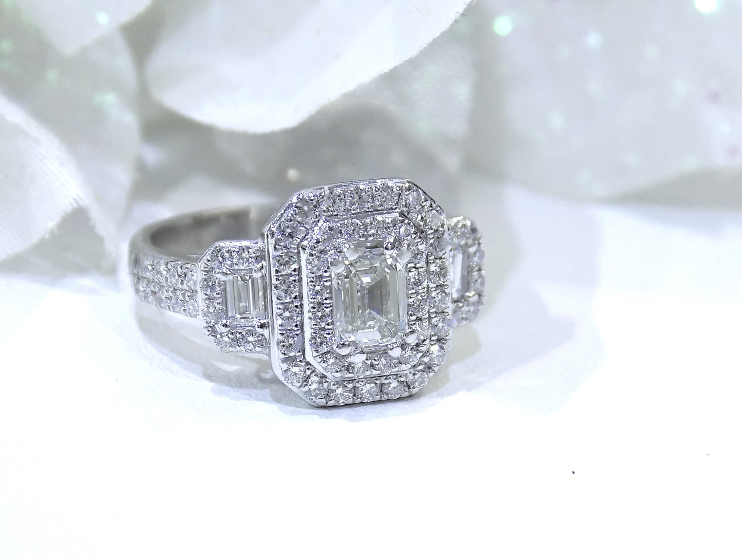 1.56ct Natural Emerald Cut Diamond Ring 3-Stone / Halo Style with a .70ct Emerald Cut Center in Platinum