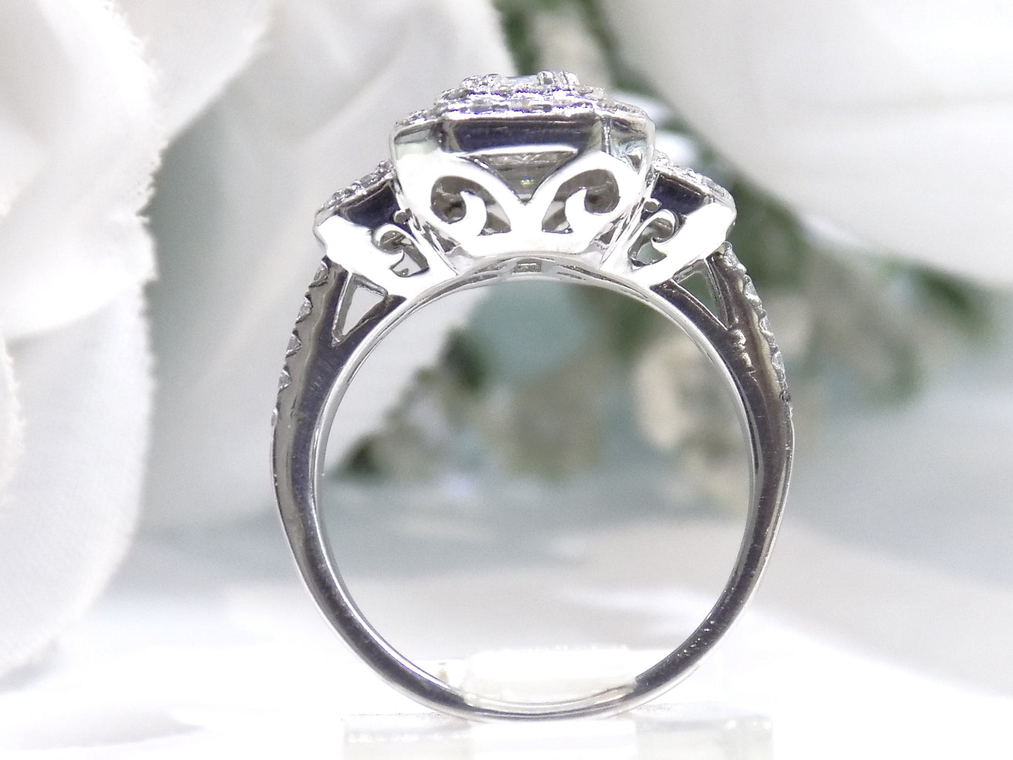 1.56ct Natural Emerald Cut Diamond Ring 3-Stone / Halo Style with a .70ct Emerald Cut Center in Platinum