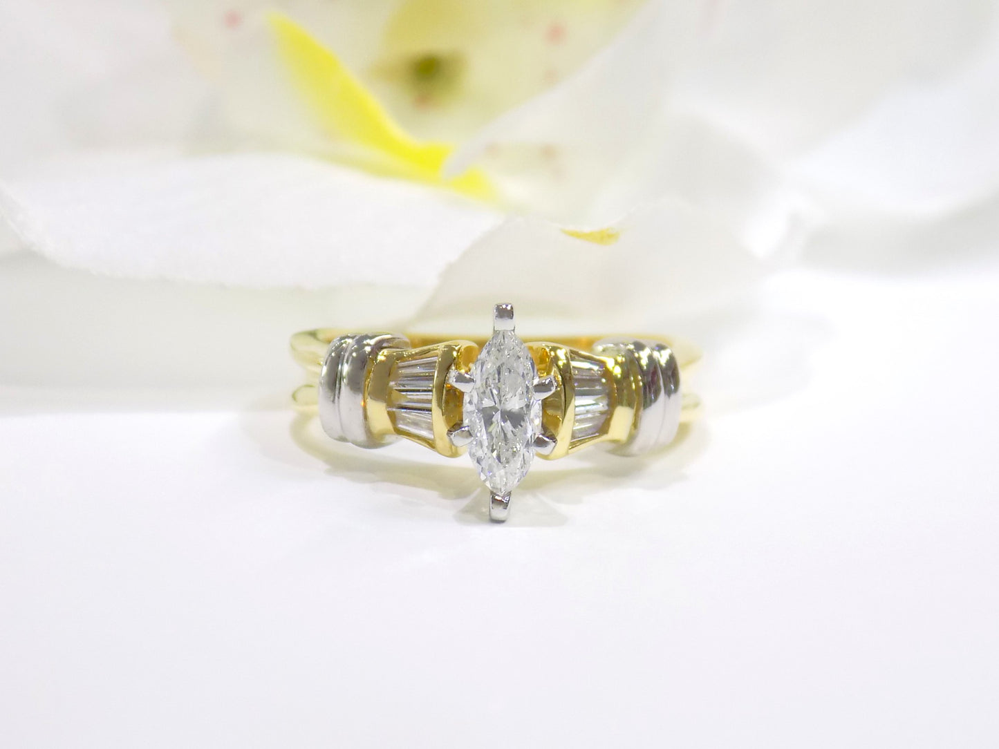 .80ct TW Natural Marquise Shape & Baguette Diamond Ring with a .44ct Marquise Center and .36ct in Baguette Diamonds set in 18K & Platinum 2-Tone Mounting