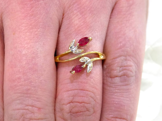 Women's .32ct TW Natural Marquise Shape Ruby & Diamond Ring in 10K Yellow Gold