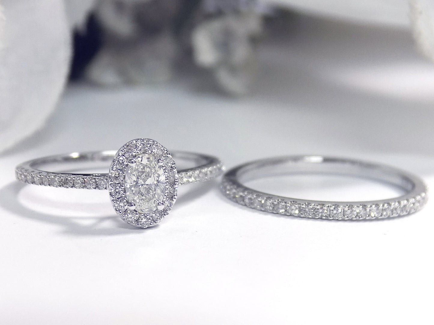 .73ct TW 2-Piece Halo Style Natural Oval Shape Diamond Wedding Set with .31ct Center Oval Diamond in Solid 14K White Gold - Straight Line/Halo Style with Matching Band