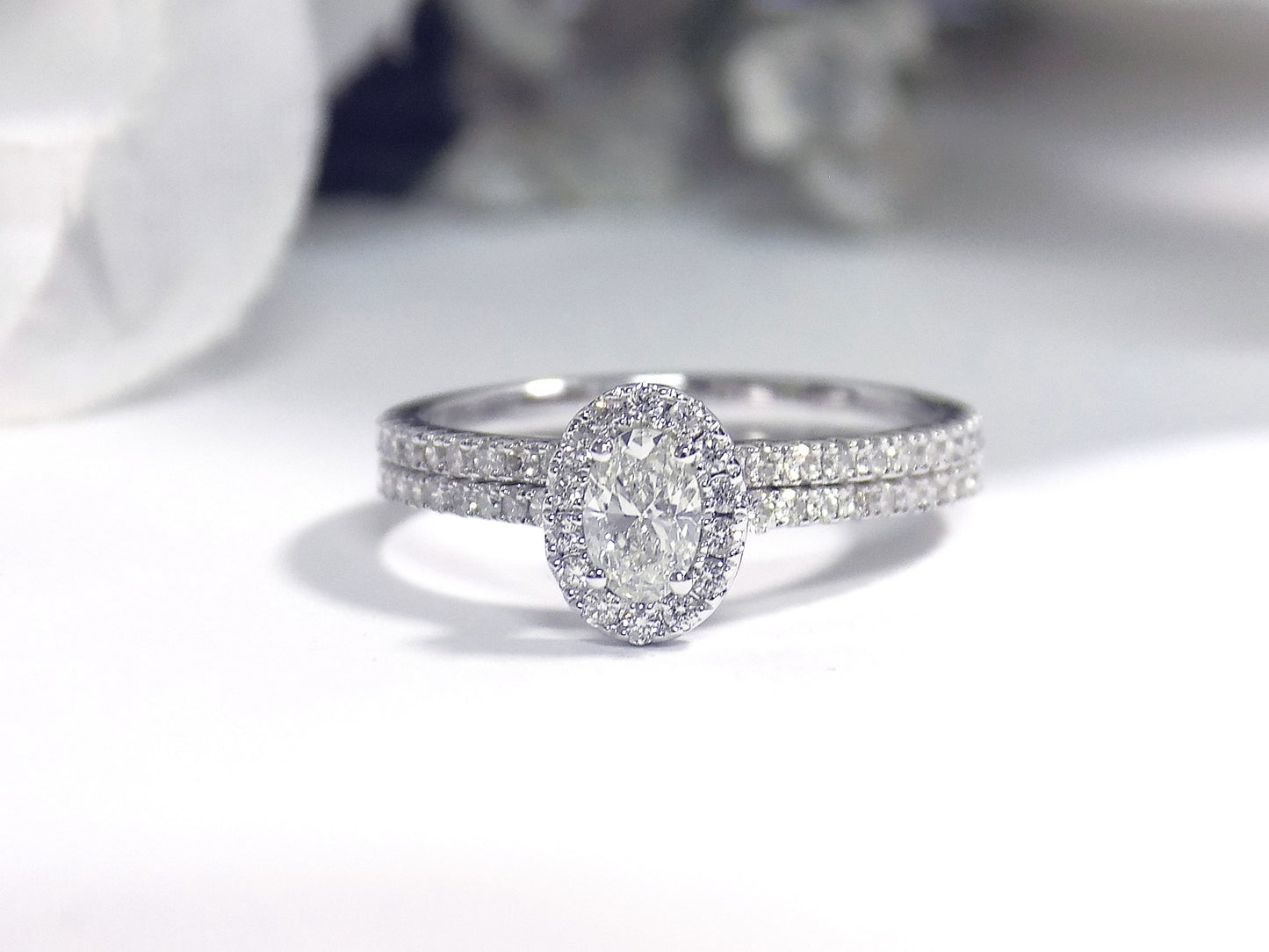 .73ct TW 2-Piece Halo Style Natural Oval Shape Diamond Wedding Set with .31ct Center Oval Diamond in Solid 14K White Gold - Straight Line/Halo Style with Matching Band