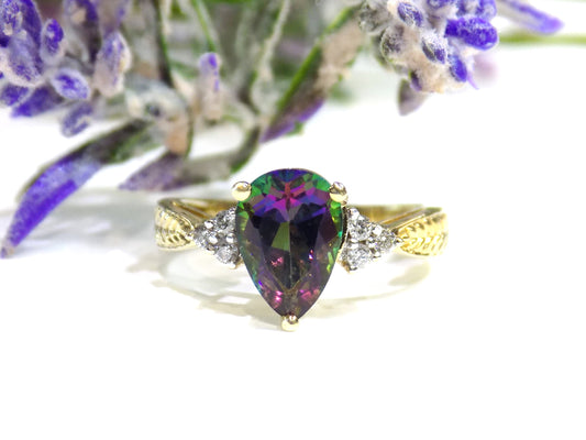 Women's 2.12ct TW Pear Shape Mystic Fire Topaz & Natural Diamond Ring in 14K Yellow Gold