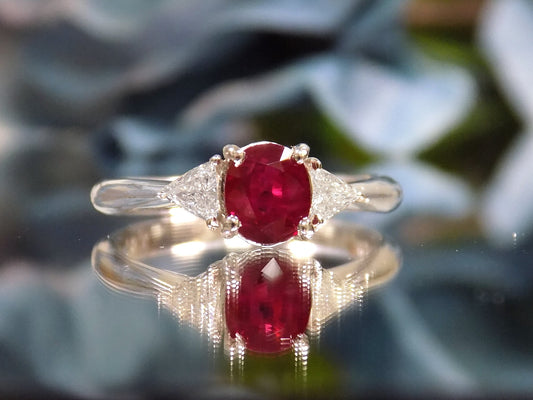 1.51ct Vintage Genuine High Quality Natural Pigeon Blood Oval Shape Ruby with a Natural Trillion Shape Diamond on Either Sider in Platinum