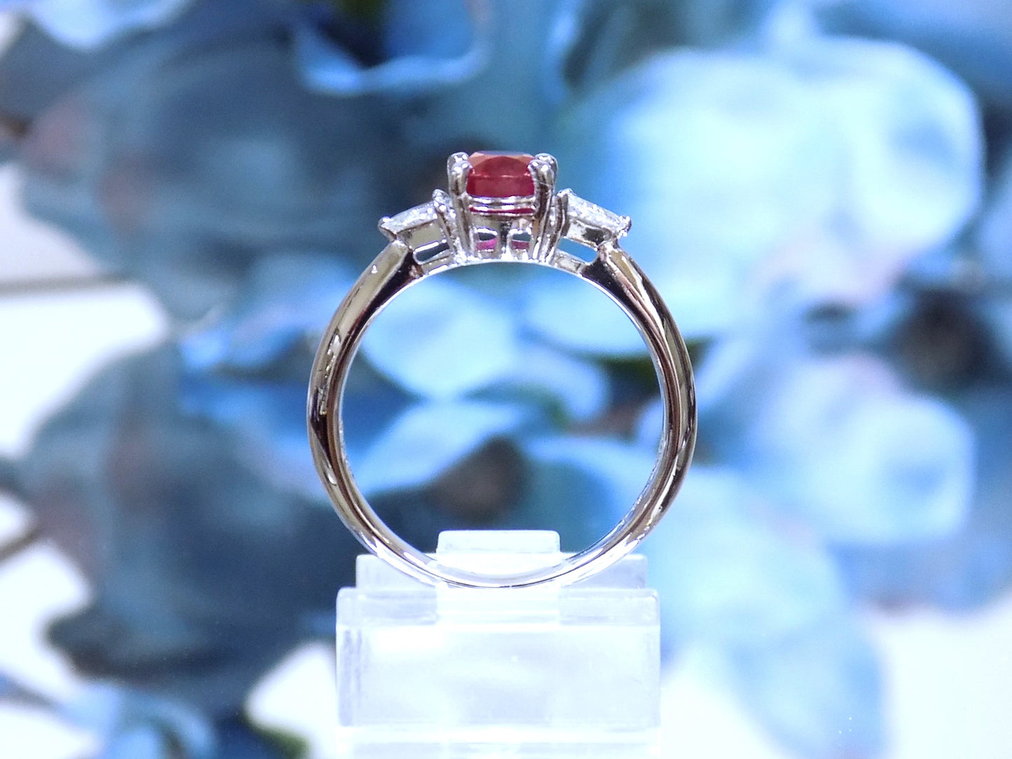 1.51ct Vintage Genuine High Quality Natural Pigeon Blood Oval Shape Ruby with a Natural Trillion Shape Diamond on Either Sider in Platinum