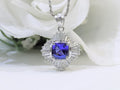 Women's 3.10ct TW Natural Cushion Shape Tanzanite with Natural Baguette Diamond Accents in .900 Platinum
