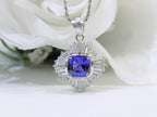 Women's 3.10ct TW Natural Cushion Shape Tanzanite with Natural Baguette Diamond Accents in .900 Platinum