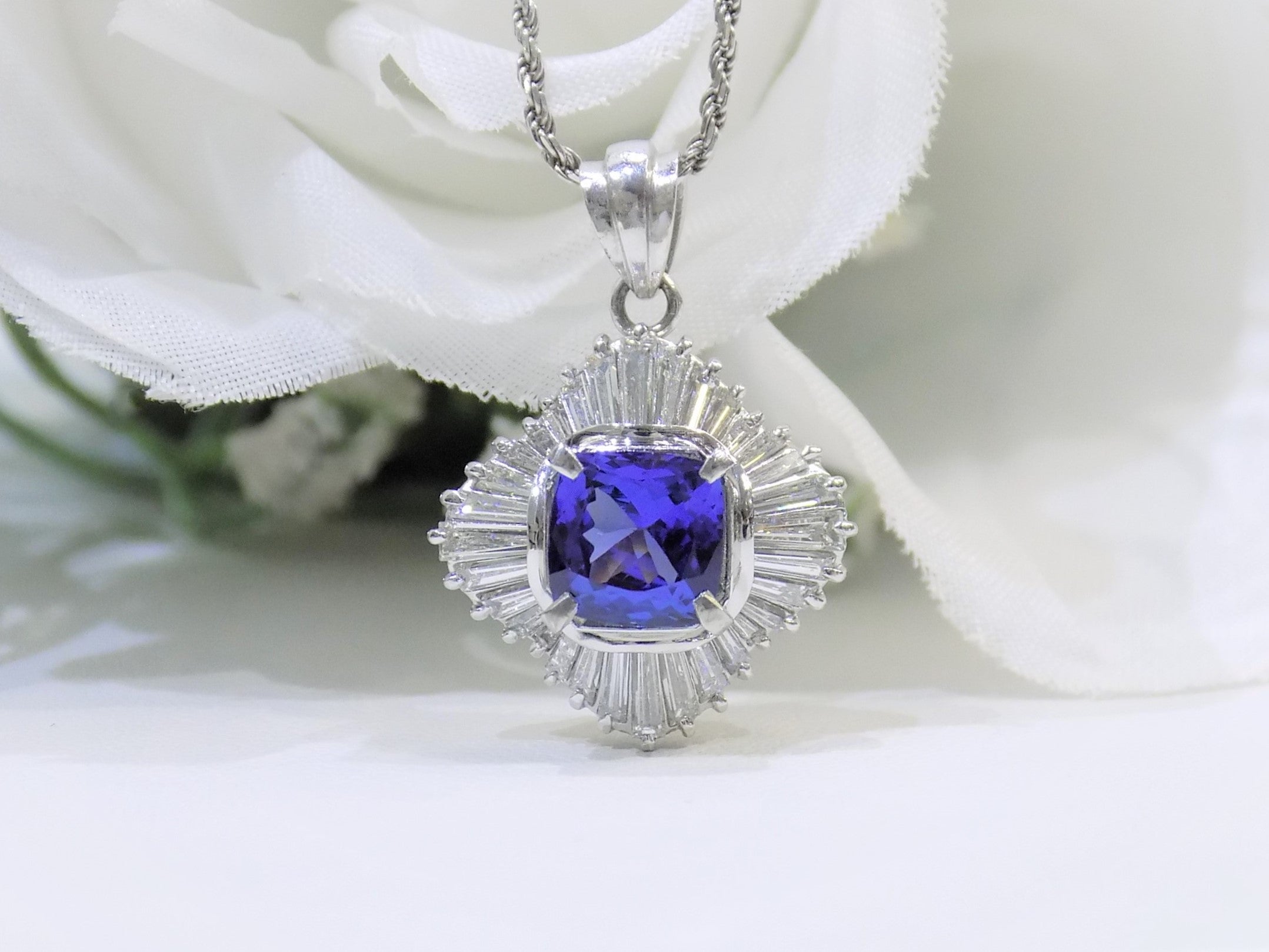 Women's 3.10ct TW Natural Cushion Shape Tanzanite with Natural Baguette Diamond Accents in .900 Platinum