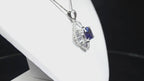 Women's 3.10ct TW Natural Cushion Shape Tanzanite with Natural Baguette Diamond Accents in .900 Platinum